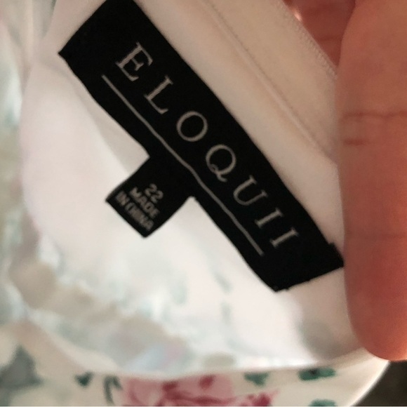 Eloquii|White chiffon floral halter jumpsuit with wide leg, open leg detail•••22 - Picture 12 of 17